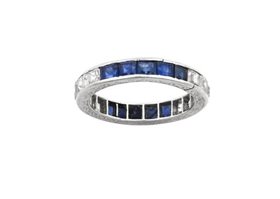 Lot 2039 - A Sapphire and Diamond Eternity Ring six...