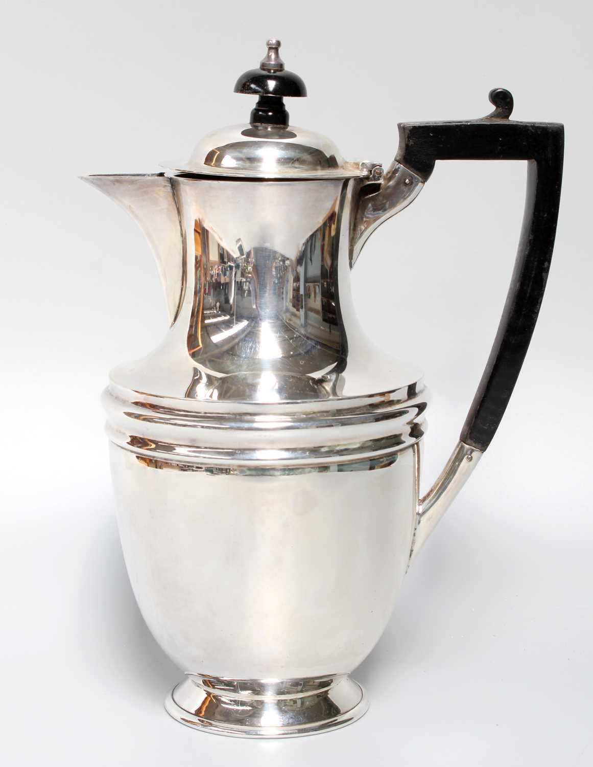 Lot 17 - A George V Silver Hot-Water Jug, by James