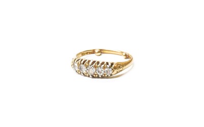 Lot 164 - A Diamond Five Stone Ring, the graduated old...