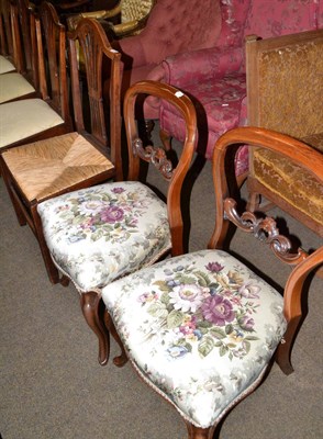 Lot 661 - A pair of Victorian rosewood balloon back salon chairs, a set of three fruitwood dining chairs...