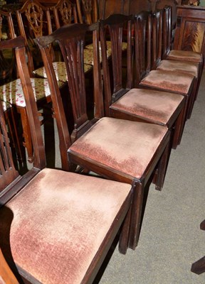 Lot 665 - A set of six Georgian mahogany dining chairs in the Hepplewhite style