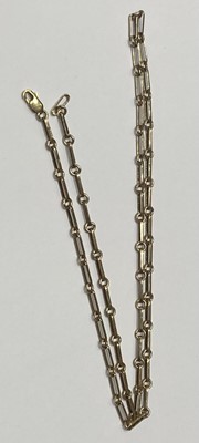 Lot 242 - A 9 Carat Gold Chain, formed of rectangular...