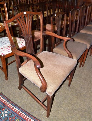 Lot 666 - A set of seven Georgian mahogany dining chairs including one carver (various repairs)