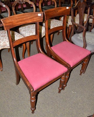 Lot 672 - A pair of mahogany bar back dining chairs