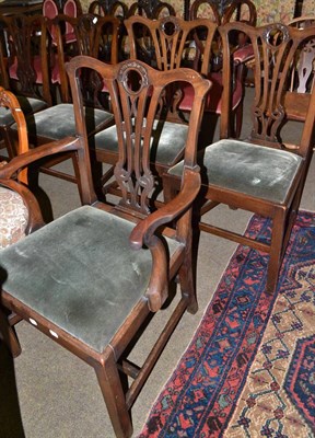 Lot 675 - A set of seven 19th century mahogany dining chairs in the Chippendale style including a carver