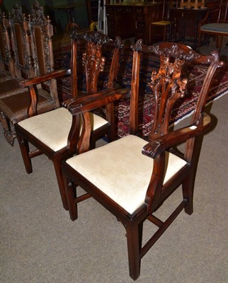 Lot 679 - A pair of mahogany carver chairs in the Chippendale style