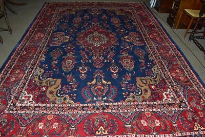 Lot 681 - A Hamadan carpet of Yazd design, Persian Kurdistan, the mid indigo field of flowering plants...