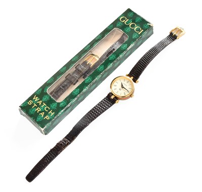 Lot 2 - A Lady's Gucci Wristwatch, with Gucci box and...