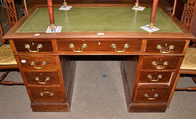 Lot 689 - A small mahogany pedestal desk