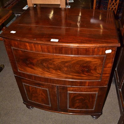 Lot 691 - A Georgian mahogany bow front night table