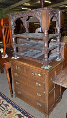 Lot 702 - A reproduction oak small four height chest and an oak four tier occasional table