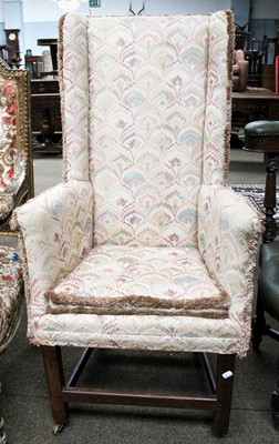 Lot 1454 - An Early 19th Century High Backed Wing Chair...