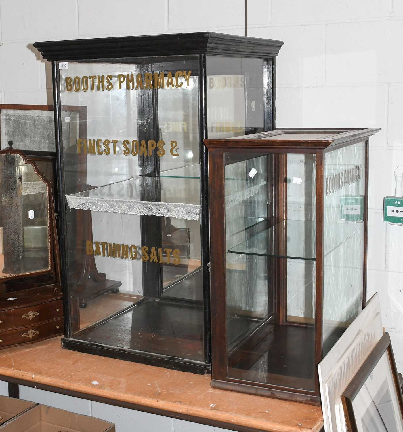 Lot 1150 - A Large Ebonised Victorian Style Shop Display,...