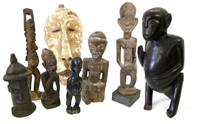 Lot 164 - A Large African Carved Ebony Figure of a Man,...