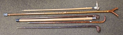 Lot 200 - A Collection of Walking Sticks and Canes, one...