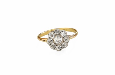 Lot 114 - A Diamond Cluster Ring, the old cut diamond...