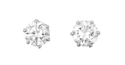 Lot 2035 - A Pair of Diamond Solitaire Earrings the round...