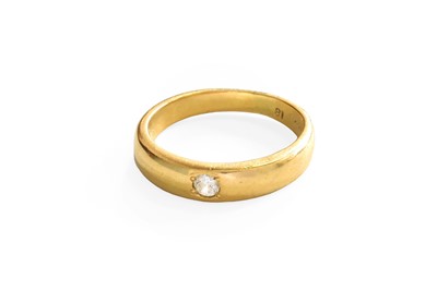 Lot 83 - A Diamond Solitaire Ring, the yellow plain...