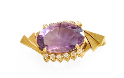 Lot 102 - An Amethyst and Cubic Zirconia Pendant,...