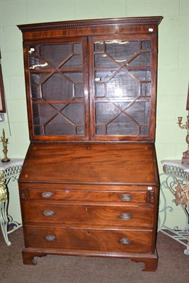 Lot 727 - A George III mahogany bureau bookcase