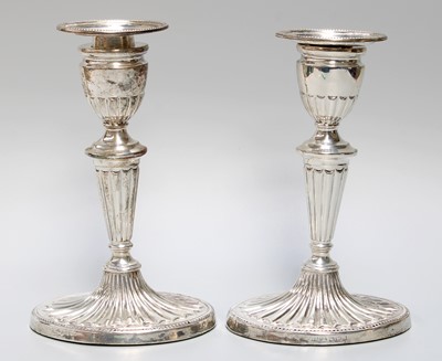 Lot 1018 - A Pair of Victorian Silver Candlesticks, by...