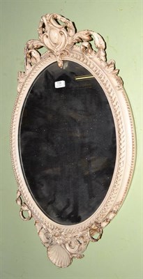 Lot 729 - A cream and gilt gesso wall mirror