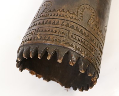 Lot 165 - A Papua New Guinea Kundu Drum, made from a...