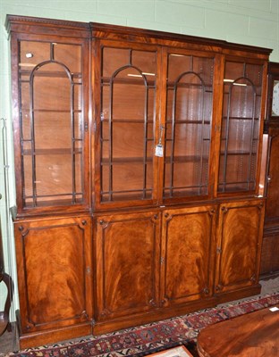 Lot 744 - A Georgian style mahogany small breakfront library bookcase