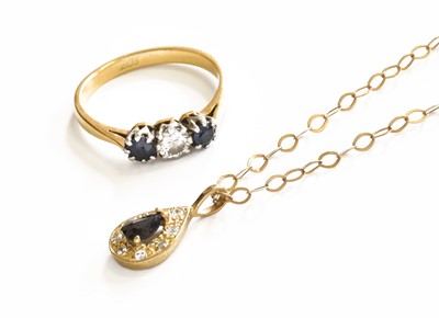 Lot 77 - A Sapphire and Diamond Three Stone Ring, the...