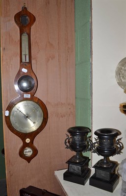 Lot 750 - Pair of French black marble urns with metal mounts and a wheel barometer (a.f.)