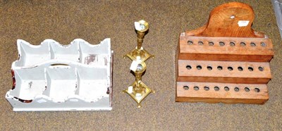 Lot 755 - Mahogany bottle carrier, pair of brass candlesticks and a spoon rack