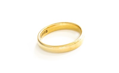 Lot 155 - An 18 Carat Gold Band Ring, finger size S