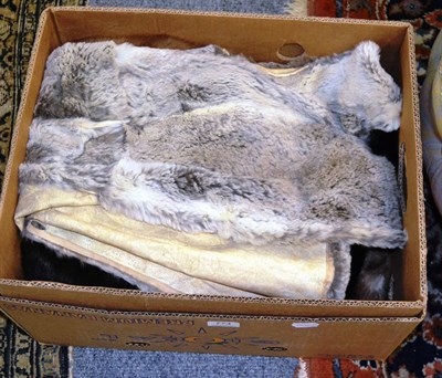 Lot 774 - Eastern fur hat with ear flaps, fur hat, fur stole, grey rabbit knee length fur gilet and length of