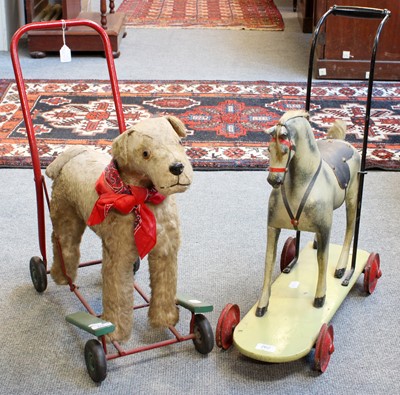 Lot 262 - Pedigree Terrier on Wheels with red bandana,...