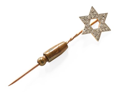 Lot 225 - A Diamond Stickpin, the star motif set...