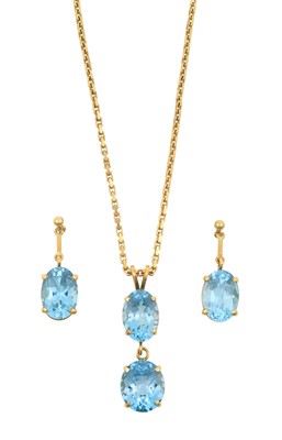 Lot 2175 - An 18 Carat Gold Blue Topaz Pendant on Chain...