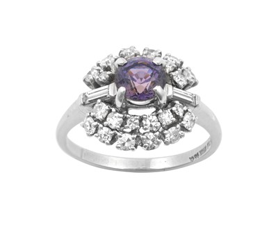 Lot 2160 - A Synthetic Sapphire and Diamond Cluster Ring...