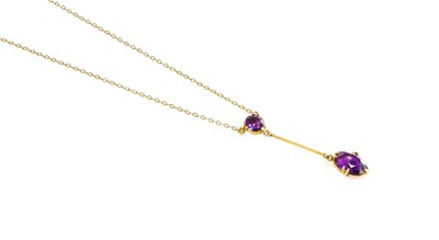 Lot 528 - An Amethyst Necklace, a round cut amethyst...