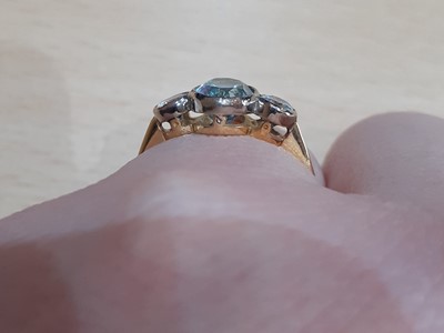 Lot 2032 - An Aquamarine and Diamond Three Stone Ring the...