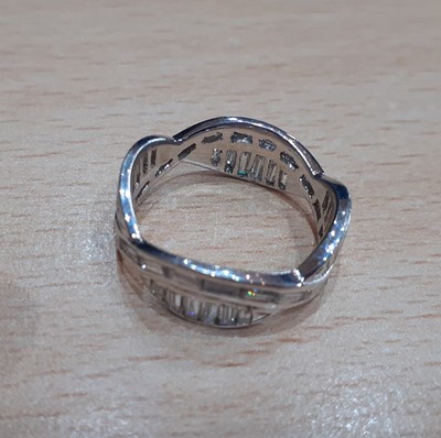 Lot 2012 - A Diamond Eternity Ring two entwined rows of...