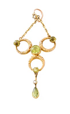 Lot 357 - A Peridot and Split Pearl Pendant, the round...