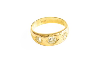 Lot 530 - A Diamond Three Stone Ring, the graduated old...