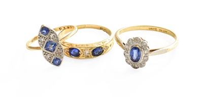 Lot 481 - A Sapphire and Diamond Cluster Ring, the oval...