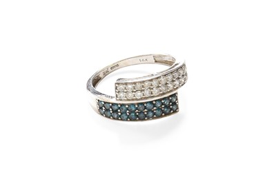 Lot 220 - A 14 Carat White Gold Diamond and Fancy Teal...