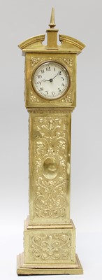 Lot 232 - A Brass Miniature Grandfather Clock