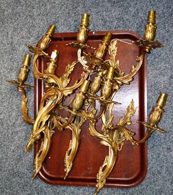 Lot 809 - Five gilt brass double wall lights