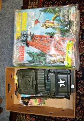 Lot 811 - Four boxes of Action Man items