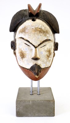 Lot 168 - A Punu Articulated Mask, with domed forehead,...