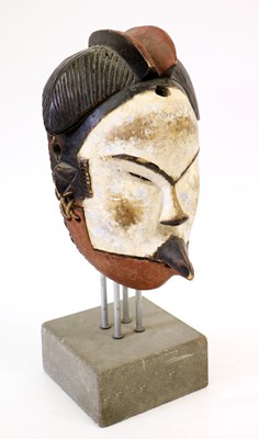 Lot 168 - A Punu Articulated Mask, with domed forehead,...