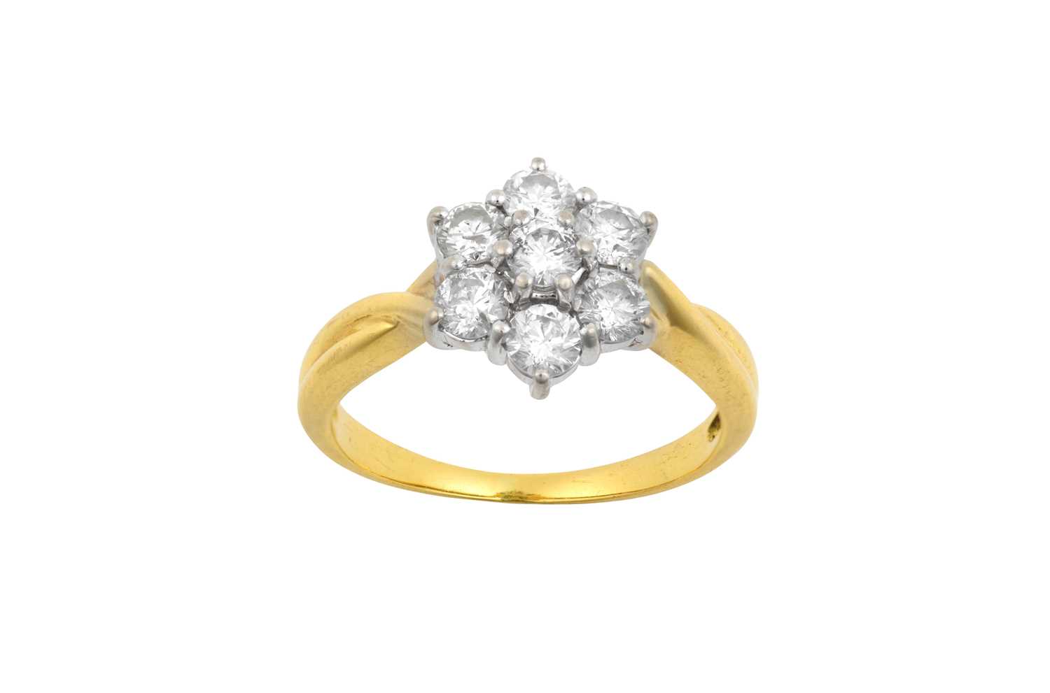 Lot 2079 - A Diamond Cluster Ring the central raised...